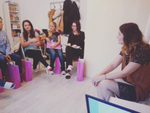 Olga Vuscan New Born Photographer for Workshops by Camen Bergmann Studio working with participants in a workshop